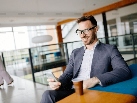 demo-attachment-2831-businessman-taking-a-break-with-a-cup-of-coffee-JW4B3DH